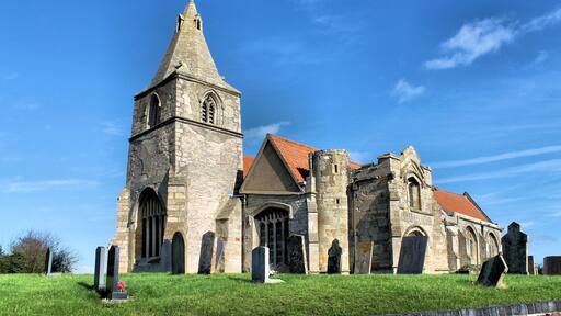 Early English and Decorated with Perpendicular tower arch. Re-used C12 and C13 material from original parish church which was demolished and rebuilt in 1862 by Edward Browning. Contains a monument to John Barton (d.1491) a rich wool merchant who founded the church. He built the tomb in his lifetime featuring him and his wife Isabella, with a cadaver "memento mori" below. 'Miseremeni mei saltem vos amici mei quia manus domini tetigit me' ('Pity me you at least my friends for the hand of the Lord has touched me'). The room over the porch is at the centre of the local legend of ‘Nan Scott’s Chamber’. It is said that Nan Scott left her house in Holme during the great plague of 1666 to live in this room away from infection for several weeks. When forced to visit her house for supplies she found the parish deserted except for herself and one other, and was so horrified she returned to the chamber and ended her days there. Pic by Jenny