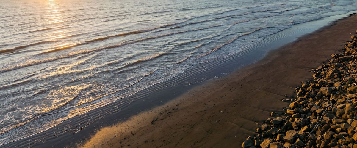Beach front of Raumati. In the background is Kapiti Island. Paraparaumu, Wellinton, New Zealand.