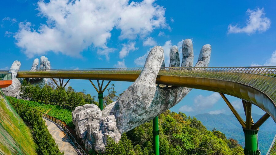 Famous tourist attraction among the tropical jungle in the forests - empty golden bridge