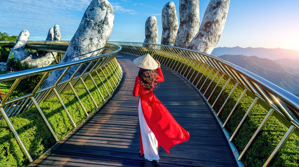 Tourist walking at Golden bridge in Bana hills, Da nang, Vietnam.