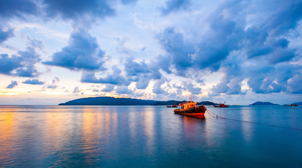 Kota Kinabalu Esplanade which includes a sunset and general coastal views