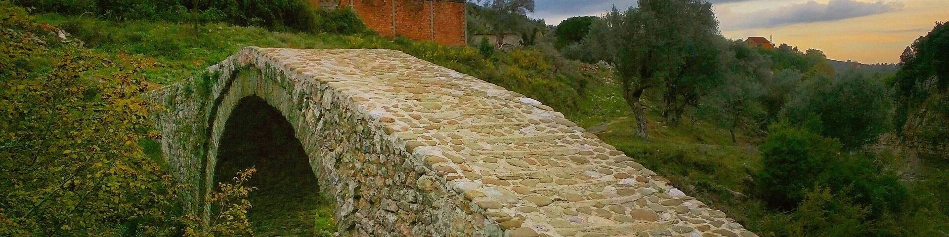 Sometimes you just discover some off the beaten path historical landmark that there's not much mention of in on Google or the web. I rented a bike to explore a village on the outskirts of Tirana, Albania and found this little diamond on the rough. An old Ottoman bridge built on top of an ancient Roman bridge on the banks of the Tirana river. Not something you see everyday!
http://www.alwayswanderlust.com/ura-e-brarit-old-ottoman-bridge/