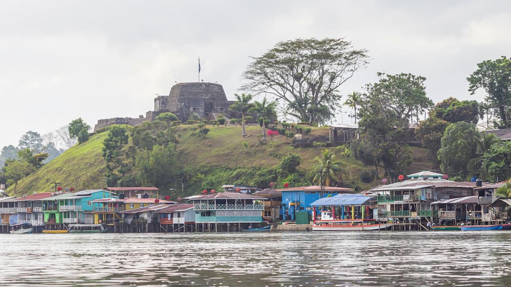 Scenic view of colorful houses and fortress of El Castillo village along the San Juan river in Nicaragua