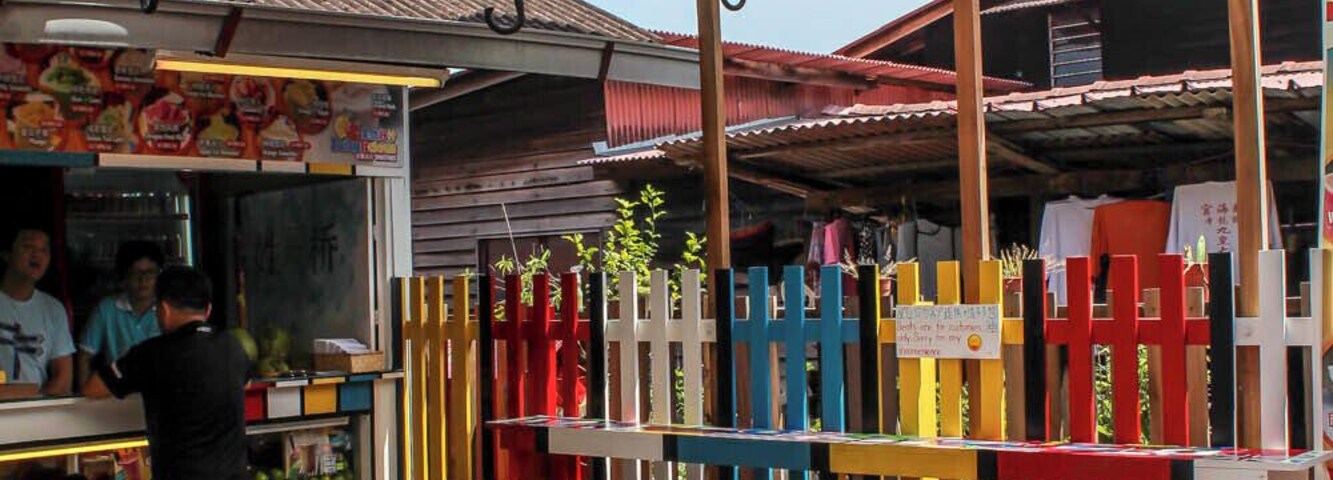 A colorful cafe at Penang's famous Clan Jetties, a waterfront society of stilt houses that are home to various Chinese clans.