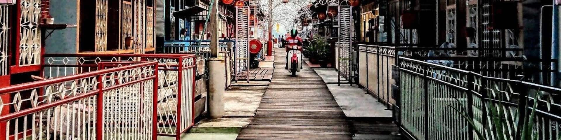 Shot at the Lee Jetty in George Town, Penang, Malaysia. The clan jetties represent a coastal fishing village that are still being run by a number families of various ethnic Chinese clans namely Lee, Tan and Chew. The jetties are easily accessible if you took the Ferry from mainland Penang and it is of walking distance.