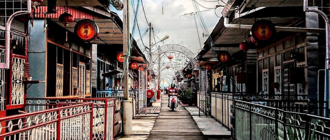 Shot at the Lee Jetty in George Town, Penang, Malaysia. The clan jetties represent a coastal fishing village that are still being run by a number families of various ethnic Chinese clans namely Lee, Tan and Chew. The jetties are easily accessible if you took the Ferry from mainland Penang and it is of walking distance.