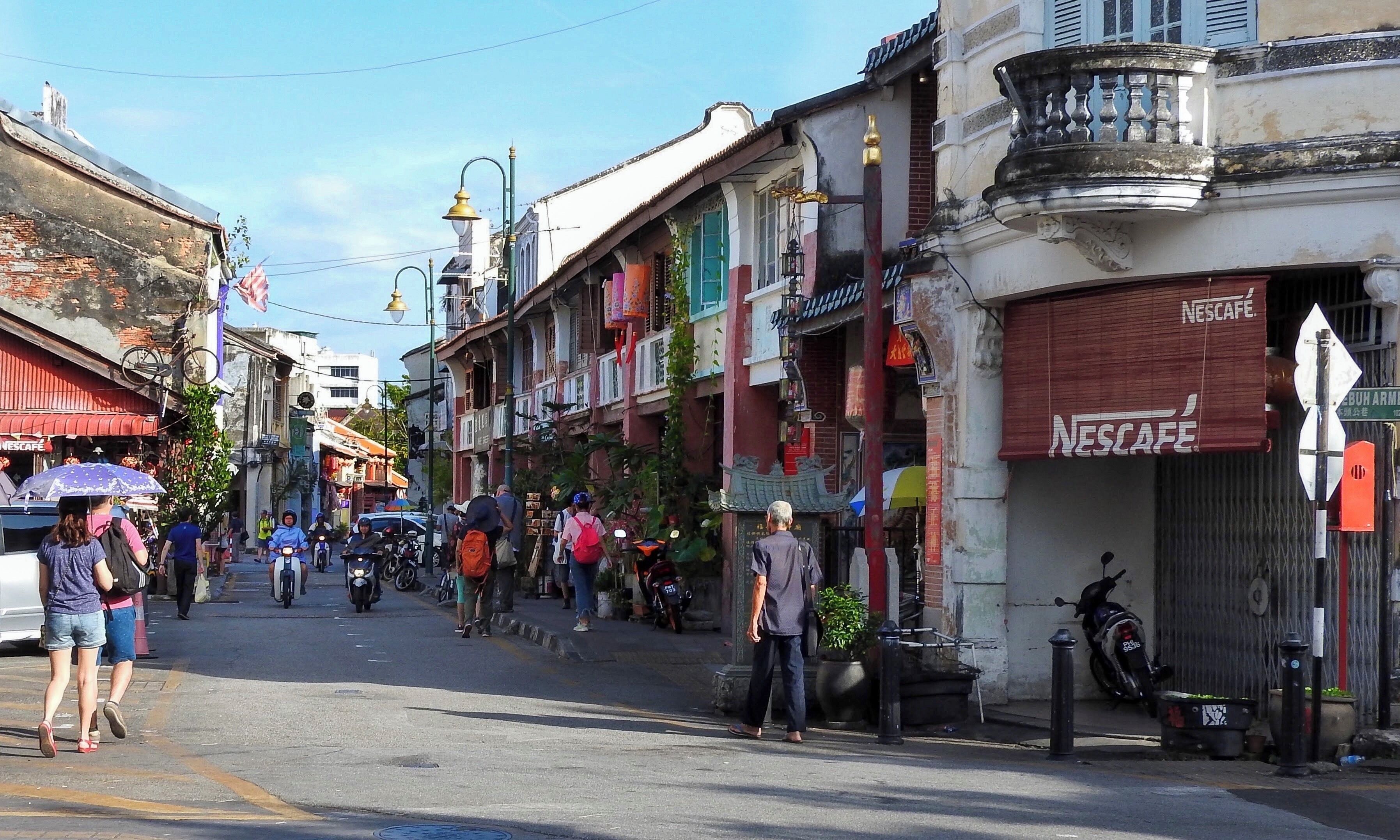 Armenian Street (Lebuh Armenian in Malay) is a narrow street within the city of George Town in Penang, Malaysia. Located within the city's UNESCO World Heritage Site, the road has gained popularity in recent years for its rich cultural offerings and street art. Further down this street is the famous 'Children on a Bicycle' mural by Ernest Zacharevic. (February 2017)