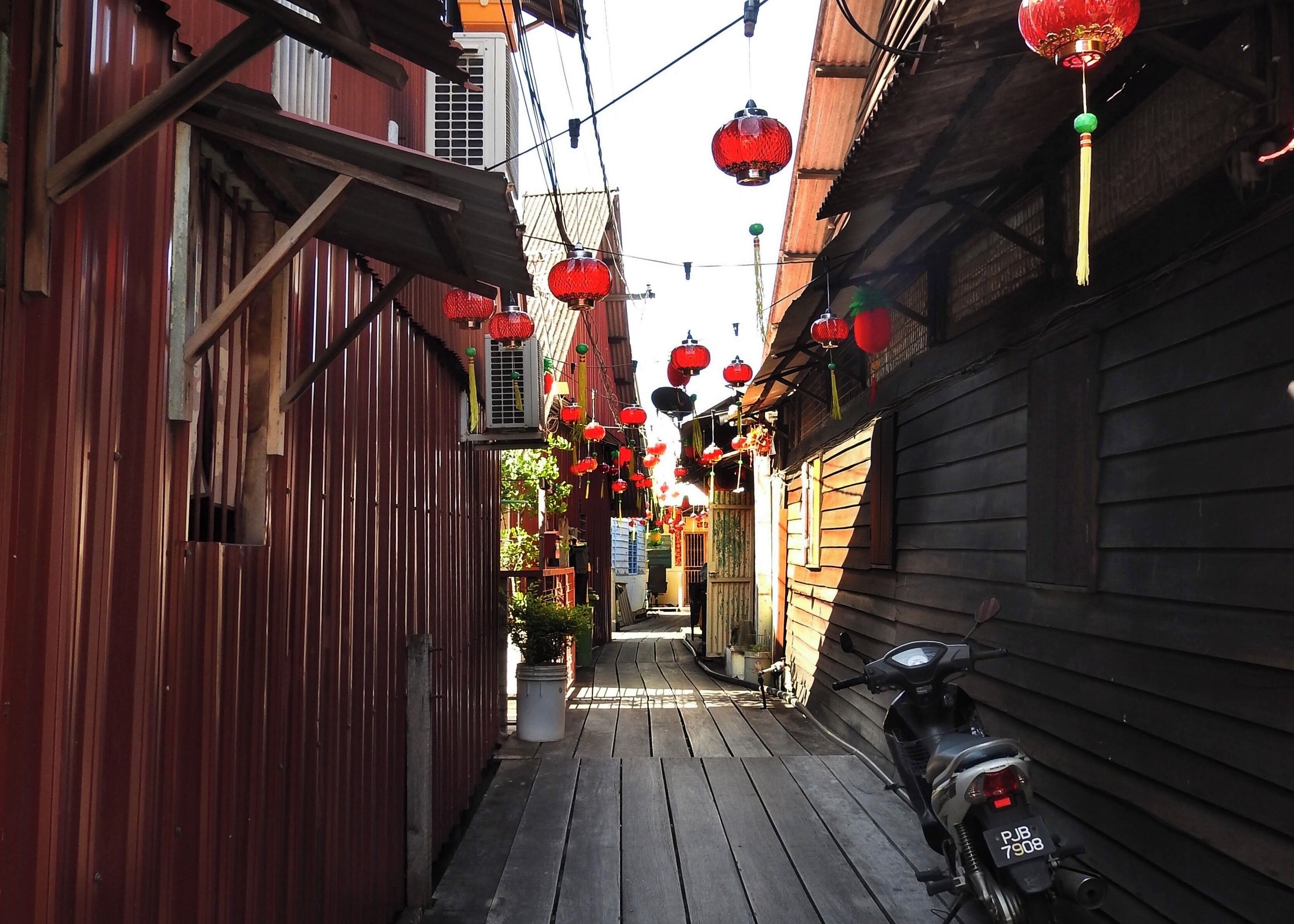 An alley in the Clan Jetties of Penang, Malaysia, which is a complete village on stilts above the water. In the 19th century many Chinese immigrants went to Malaysia. A UNESCO World Heritage Site, there are a total of 6 of these villages, in which every village lives one clan.  (February 2017) 

#OnTheRoad #Culture Photo Contest
