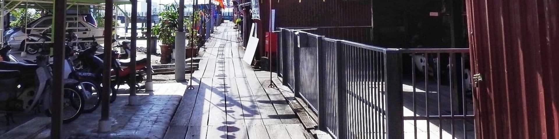 These water villages are over a century old and home to poor Chinese immigrants who had come to work mostly as port labourers during a time when maritime trade in Penang, Malaysia, was booming. As they couldn't afford housing on land, their houses were built on stilts above the water. This is the Lim Jetty (one of six) which does not have any commercial activities. On the right hand side are homes fronting the main wooden boardwalk to the pier. A UNESCO World Heritage Site (February 2017)
#History