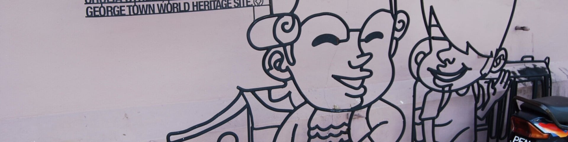 Historic Georgetown is a UNESCO World Heritage City. Throughout the historic area are these metal sculptures giving information in a whimsical way. We probably found only a handful of them while we explored the historic district. Take a walk and keep your eye out for these fun, unique signs. We think they are much better than the typical tourist information sign!