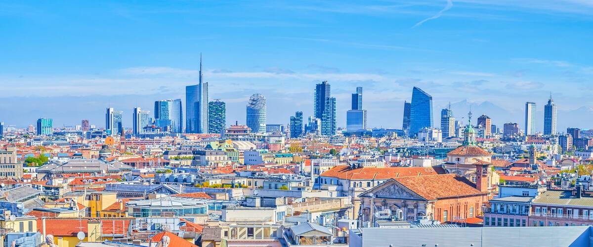 The roofs ofhistoric buildings and the Milan Financial District in the background, Italy.