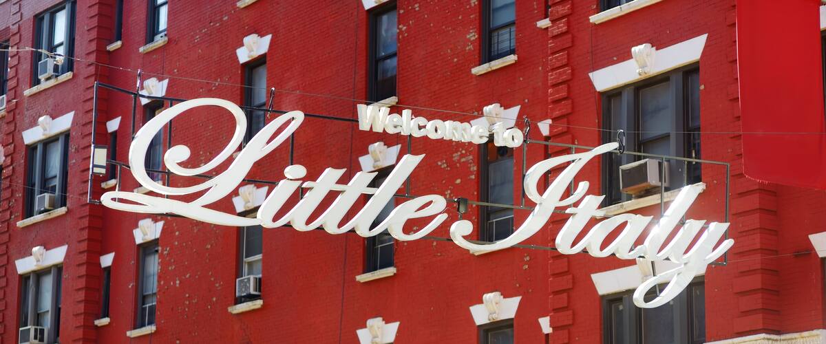 'Welcome to Little Italy' sign in Italian community named Little Italy in downtown Manhattan, New York City.