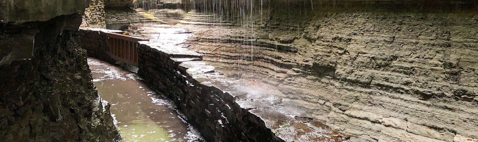 Stream, waterfalls, cliffs and rocks. Hiking trail at Watkins Glen State Park, Upstate New York, south of Seneca Lake in Finger Lake Region