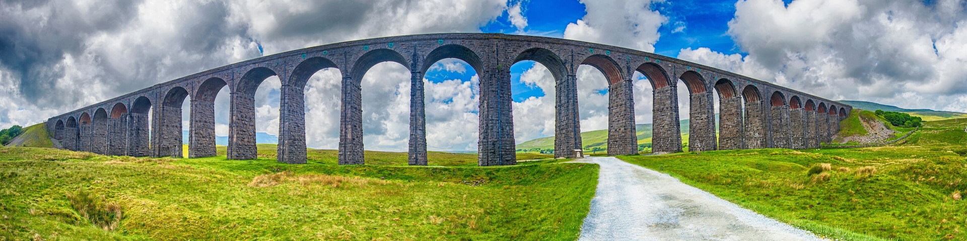 View of large Victorian viaduct in rural countryside scenery