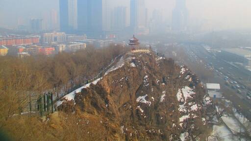 Having a walk up on Hongshan park, in Urumqi, China.