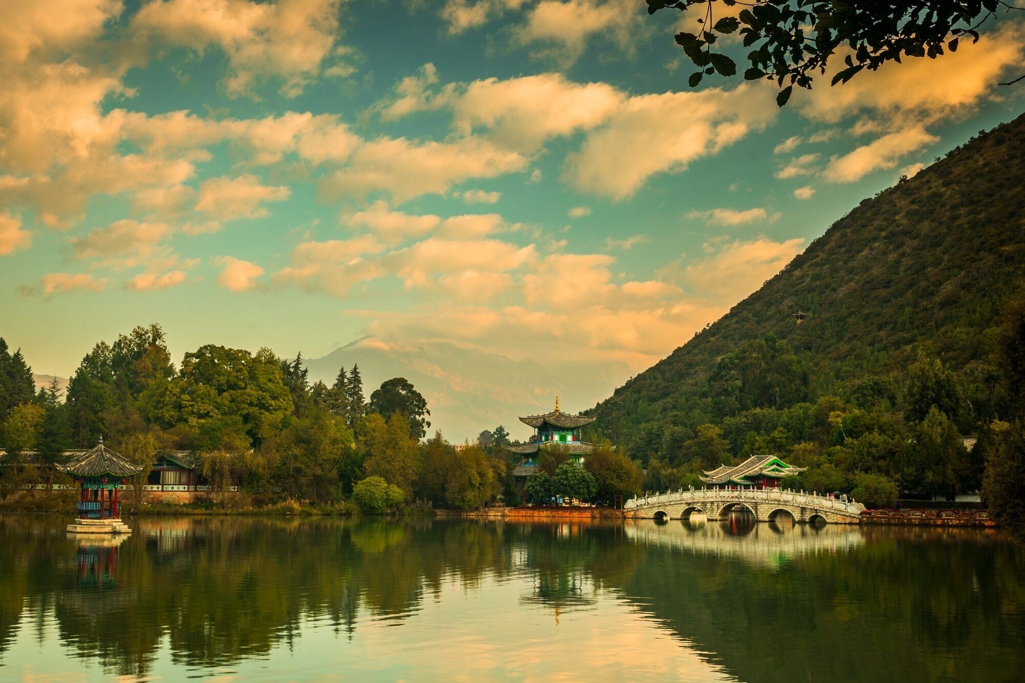 Black Dragon Pool Park is a lovely park at the edge of the ancient town of Lijiang. Get there early before the clouds cover the Snow Dragon Jade Mountain in the background. During the day it provides a calm walk and some nice cafes. #GreatOutdoors