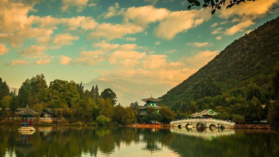 Black Dragon Pool Park is a lovely park at the edge of the ancient town of Lijiang. Get there early before the clouds cover the Snow Dragon Jade Mountain in the background. During the day it provides a calm walk and some nice cafes. #GreatOutdoors
