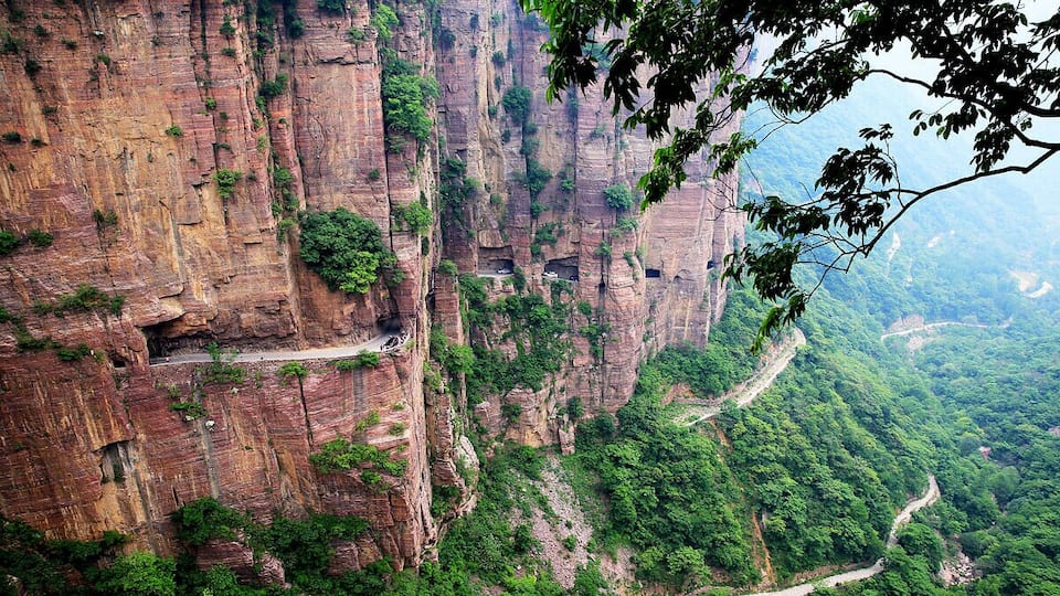 #GuoliangTunnel Road is one of the most famous tunnels in the world,it’s located high in the Taihang Mountain of the Henan Province,China. The road is narrow and steep, very dangerous but amazing ,especially in the wet conditions.Now, the tunnel is not only a way for the villagers connect to the outside world,but also an famous attraction in China.