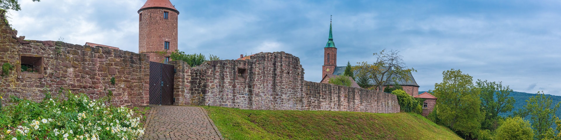 Panorama of the old city wall in Dilsberg, a village in southern Germany with church and old tower