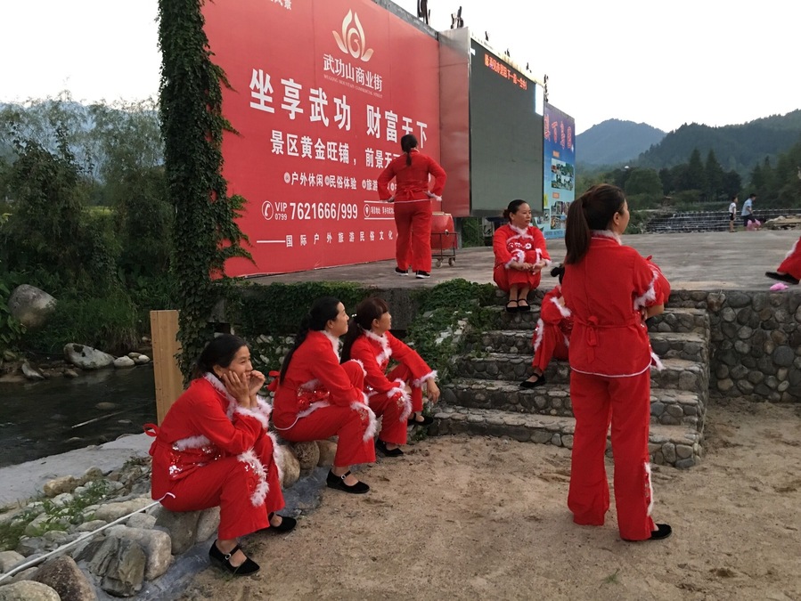The red ladies are set and ready to perform the dragon dance. #red #redphoto you #china