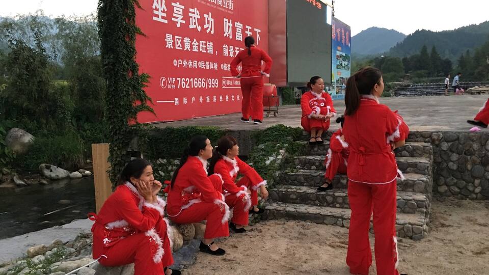 The red ladies are set and ready to perform the dragon dance. #red #redphoto you #china