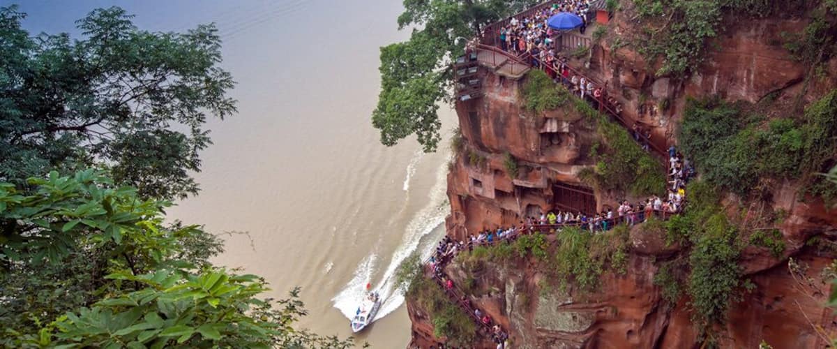 The Leshan Giant Buddha is a 71-metre (233 ft) tall stone statue, built during the Tang Dynasty.It isa statue of Depicting Maitreya in sitting posture.As the biggest carved stone Buddha in the world.
 乐山大佛
https://twitter.com/Beautifulgx