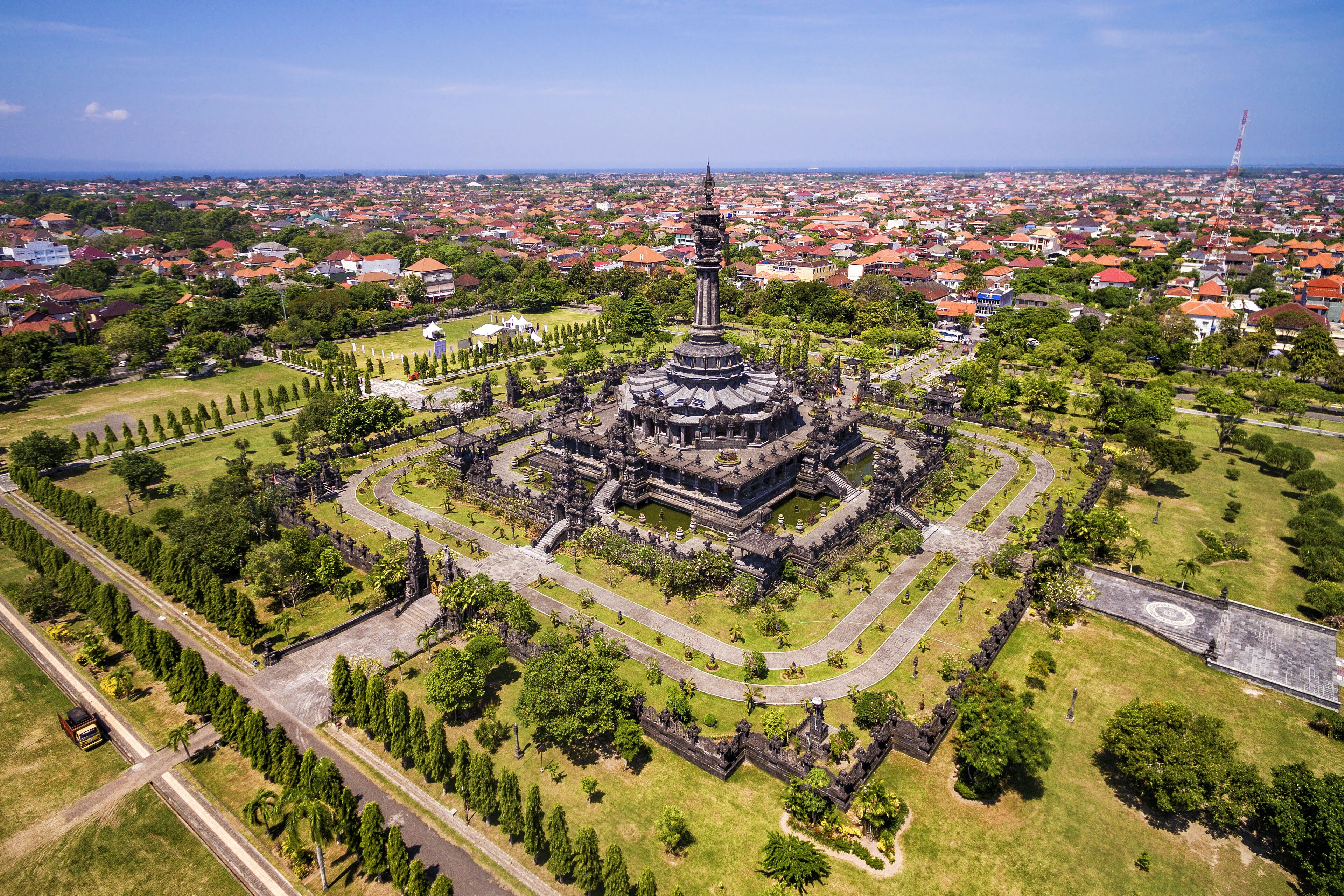 An aerial view of a historic temple complex surrounded by a cityscape.
