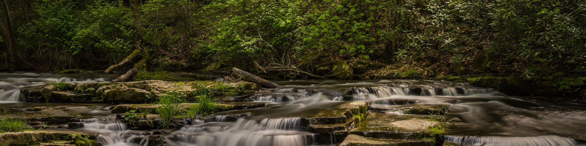 Mill Creek cascades on river in West Virginia