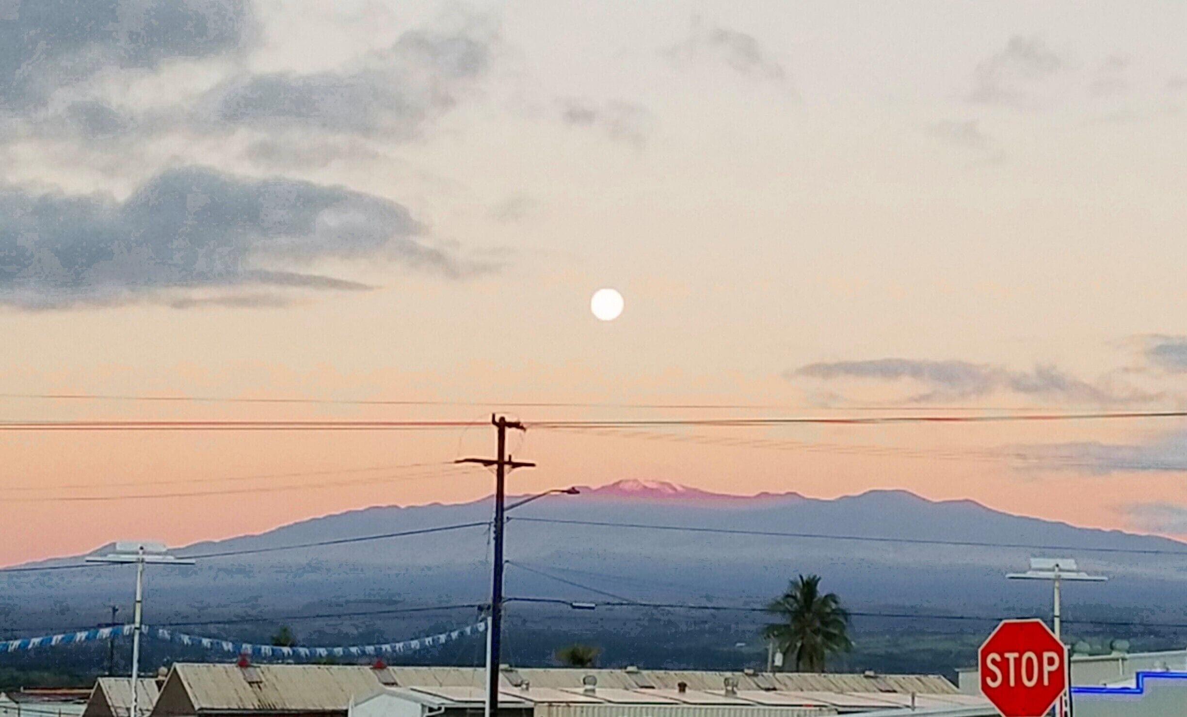 This may only be possible here; a snow capped mountain with palm trees in the foreground. And if that's not enough how about a brilliant full moon descending into the rosy warmth of sunrise?
#WinterWonders
