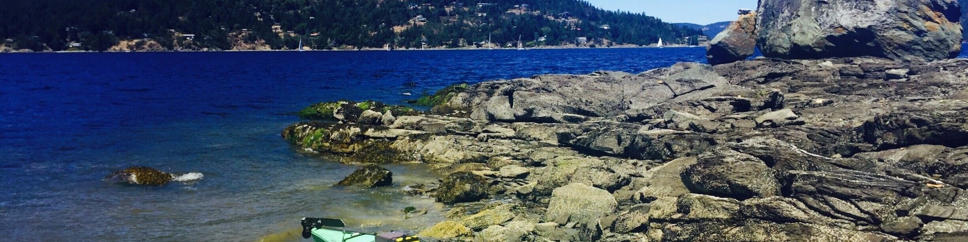 Kayaking Maple Bay in Victoria, BC, Canada.
It was quiet, beautiful, and cheap! We rented our kayaks for $25usd for both for a few hours. There are a few spots where you can pull up your kayak and relax on the rocks.