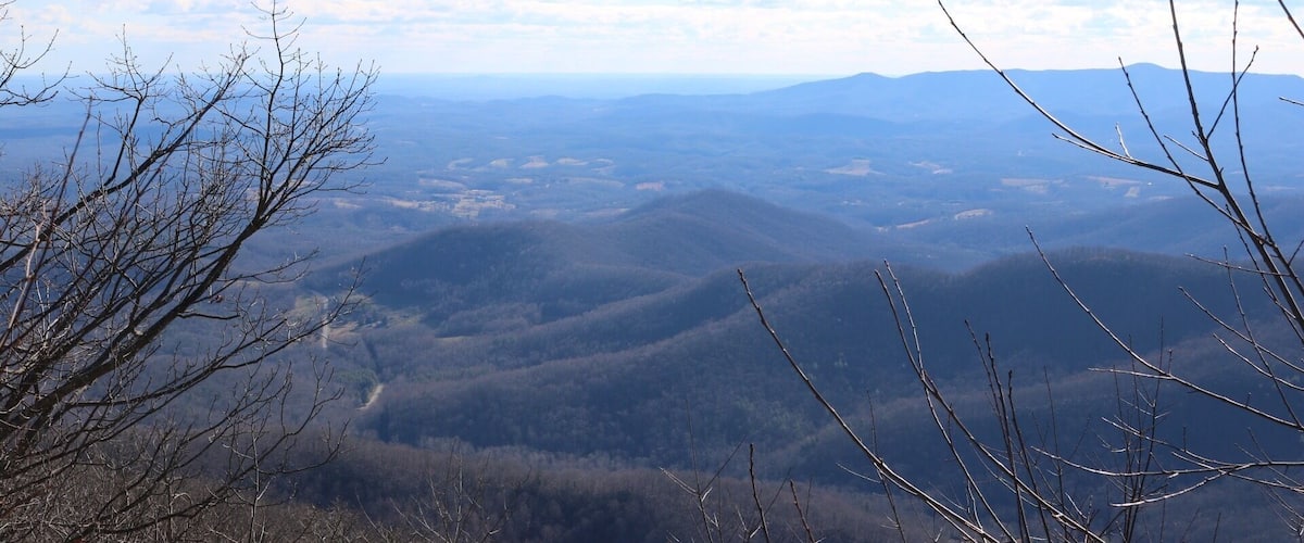 A mountainous landscape with a clear sky.