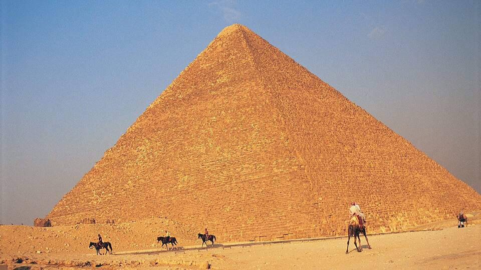 Five People Riding Horses in Front of the Cheops Pyramid, Giza, Egpyt