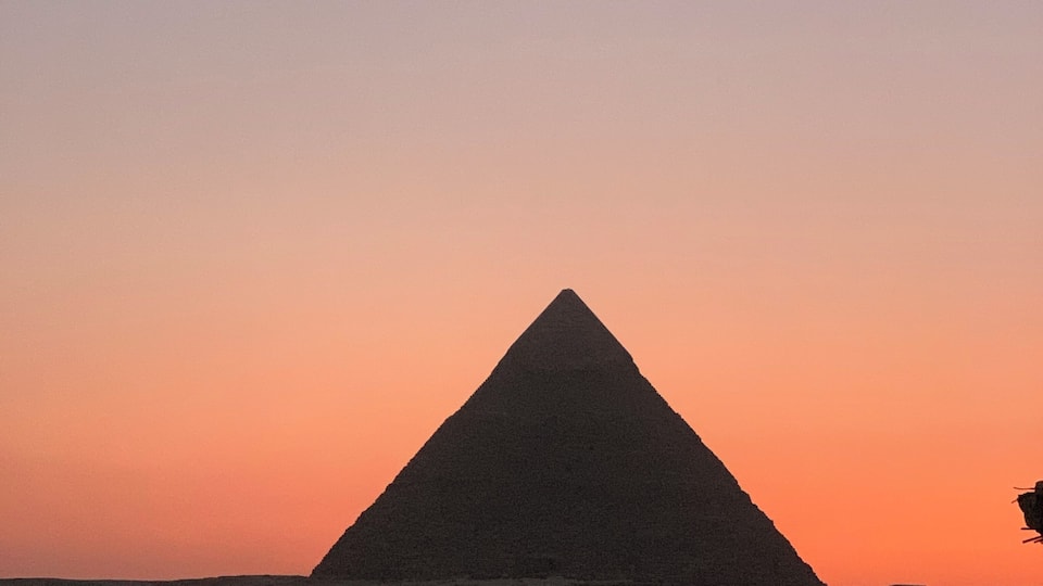 Giza Pyramids at Sunset.
Only existing ancient wonder of the world. Pyramid is about 4000 years old and tallest one amongst. Built by accurately cut limestones brought from Nile River of Aswan. The technology they had in those days to transport and build such heavy rocks is mind blowing. It’s not just the pyramids that will blow your mind away there are 100s of artifacts found and currently preserved in the Egyptian museum makes you wonder how much knowledge they had about chemistry and civil engineering. #history #GizaPyramids #NoFilters