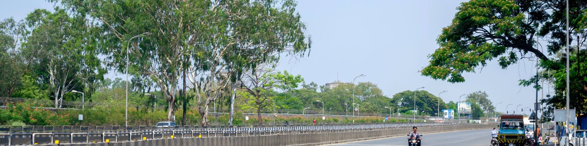 Pune, India - March 22 2020: Empty roads at Kharadi, Pune after PM Modi's call for a Public curfew from 7am to 9am on 22 March to fight and stop the spread of the Coronavirus epidemic in India.