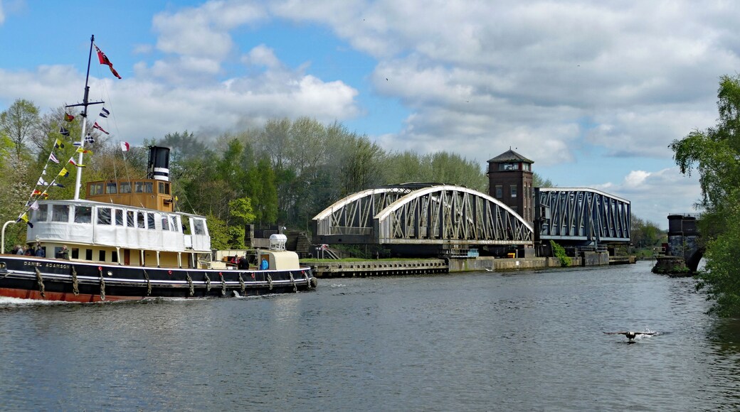 The restored 1903 steamer Daniel Adamson steaming west at Barton-upon-Irwell, with the two swing bridges in the background.