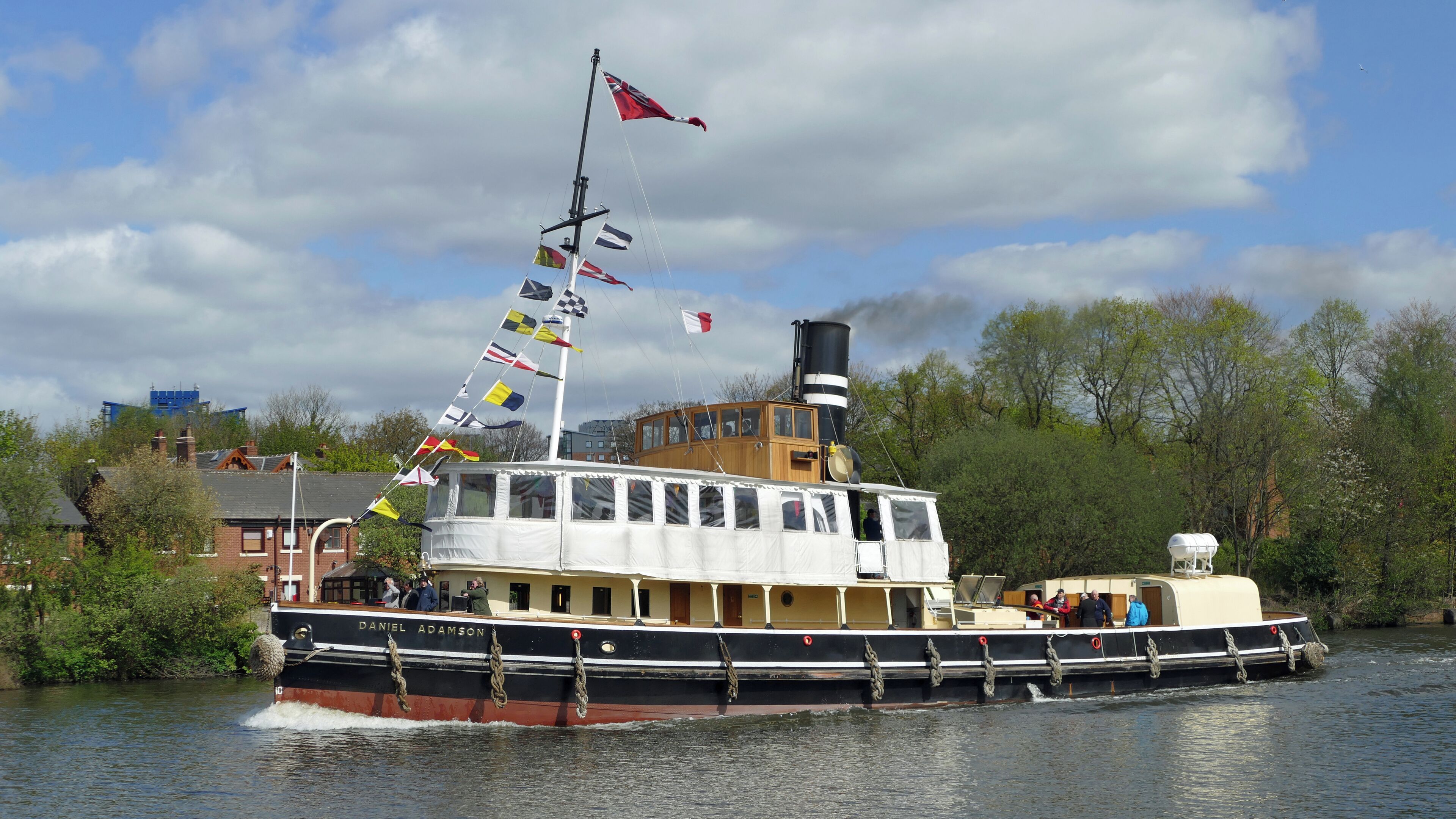 The restored 1903 steamboat Daniel Adamson under way in the Manchester Ship Canal near Barton Road Bridge, in Barton-upon-Irwell, Salford.