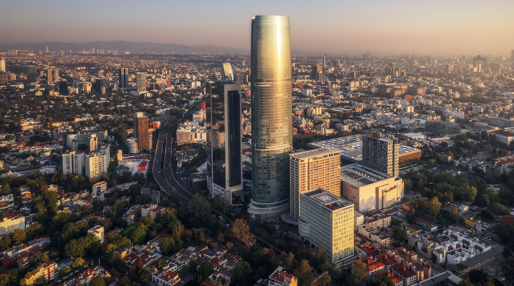 Aerial view of mitikah tower illuminated at night with a stunning cityscape, coyoacan, mexico.