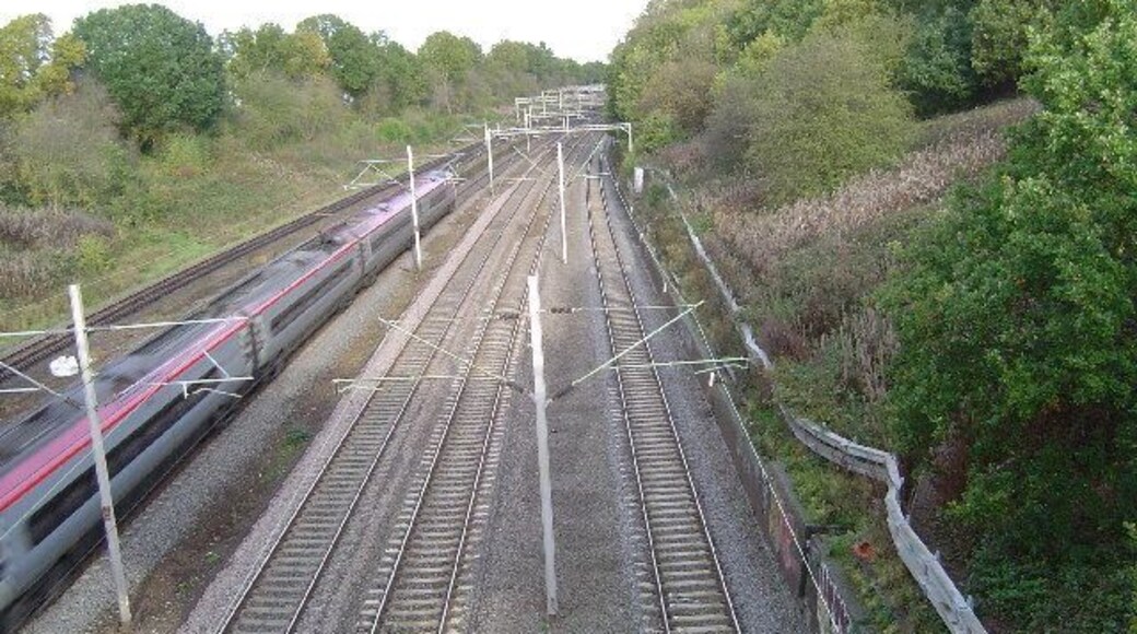 Carpenders Park: West Coast Main Line railway. Viewed looking northwards from the B4542 Little Oxhey Lane overbridge towards Carpenders Park station.