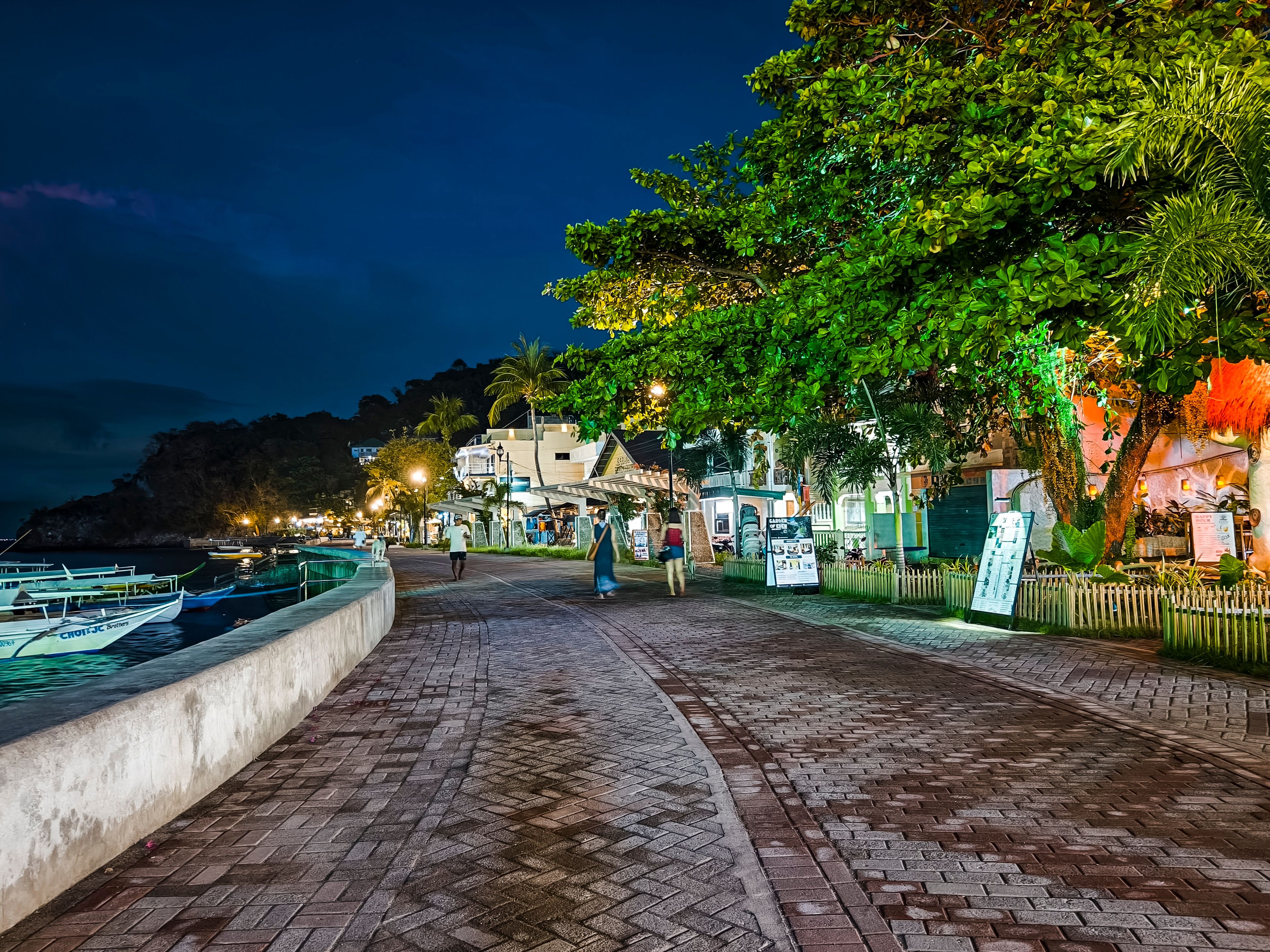 Boardwalk at Sabang Beach, Puerto Galera at night with ambient lights