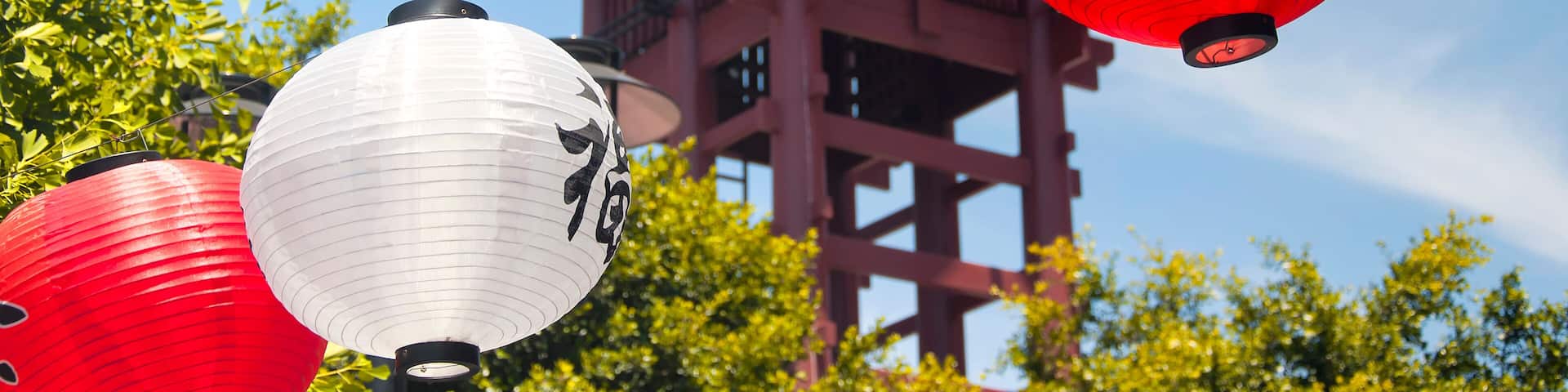 red and white lanterns hanging in Los Angeles California Japan Town. Fu and Cha characters mean tea and good luck.