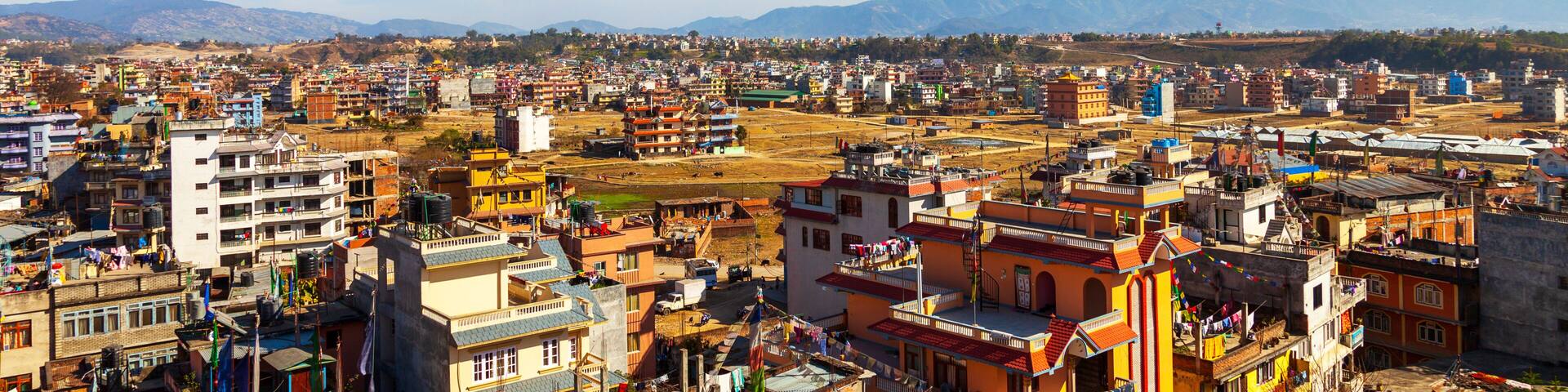 The airplane takes off from Kathmandu city, Nepal. Landscape of Kathmandu in winter blue sky. Aircraft take off from Tribhuvan international airport.One of the most dangerous air travel in the world.