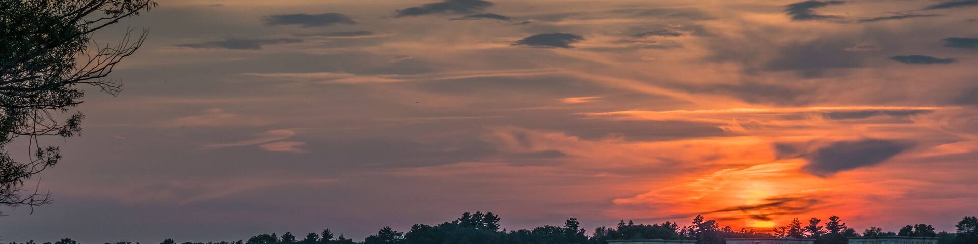 OTTAWA, ONTARIO / CANADA - JULY 30 2017: SUNSET AT OTTAWA RIVER. GATENAU VIEW.