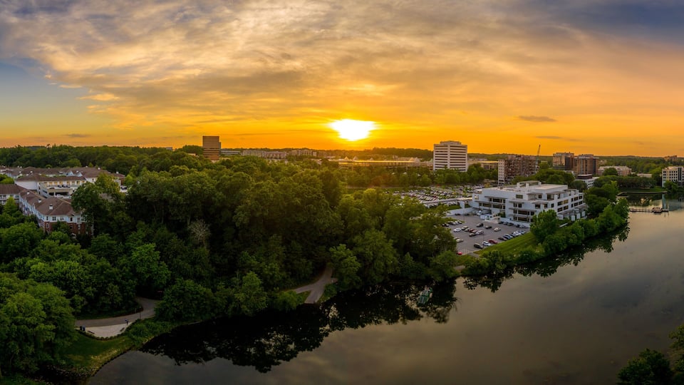 Aerial sunset panorama of Columbia Town Center in Maryland new Washington DC with office buildings and the Columbia Mall
