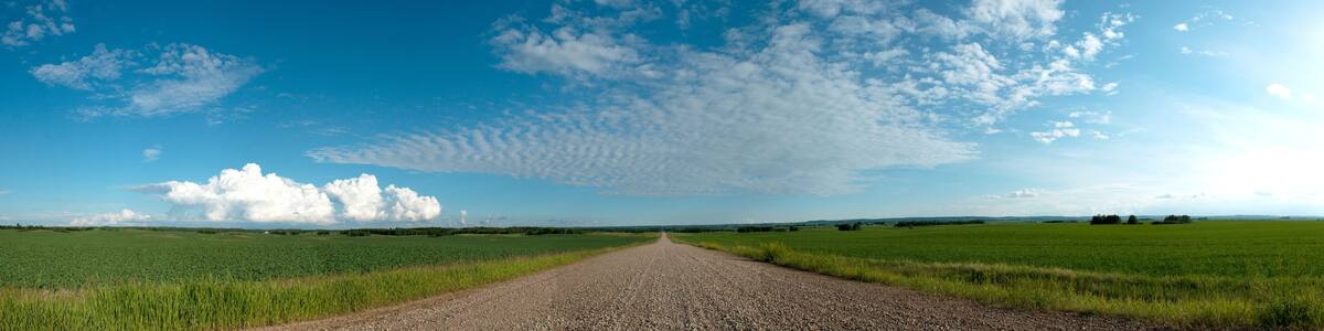 Alberta Road Panorama in the sunshine with beautiful clouds