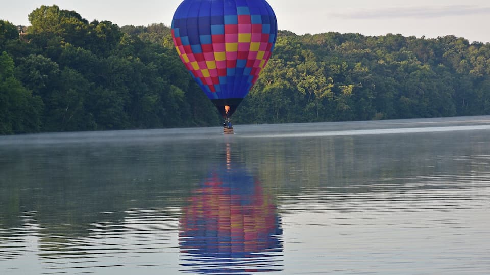 Hot Air Balloon touching down on Lake Galena. If you look closely at the bottom of the basket it is in the water. the owner was training a pilot and thankfully I was there to capture images. What an amazing sight. 10 minutes later that balloon was at 3000 feet.