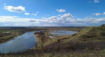 Bow River near the neighborhood of Cranston in Calgary, Alberta, Canada. Big River in southern Alberta known for its trout fishing. It is also used by the city of Calgary for freshwater supply.