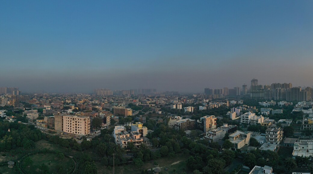 Coronavirus, Covid-19, lock down situation in delhi, india, Panoramic aerial view of Noida,gurgaon, india, Rapid metro tracks in urban areas of Delhi NCR. Cityscape.. sars-cov-2