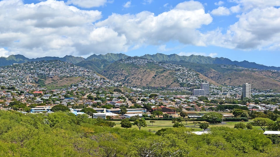 Honolulu city landscape with mountains and blue sky near Kaimuki / Kahala on Oahu, Hawaii.