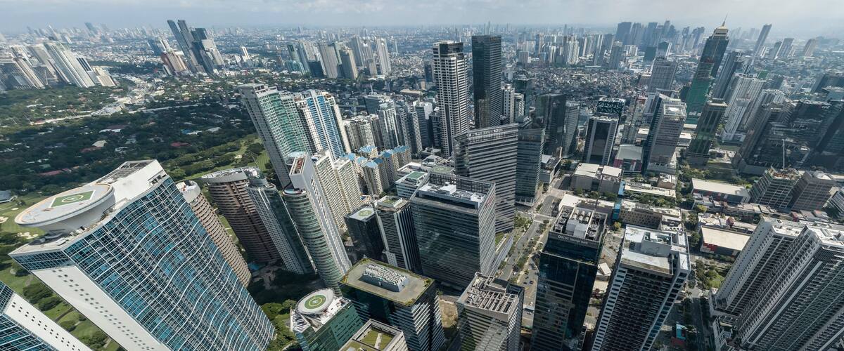 Bonifacio Global City, Taguig, Metro Manila - Panoramic aerial of Fort Bonifacio skyline and Metro Manila urban area. Ortigas skyline at the back.