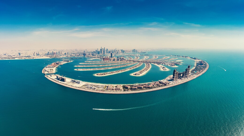 Aerial view on Palm Jumeira island in Dubai, UAE, on a summer day.